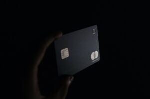Black credit card - black background